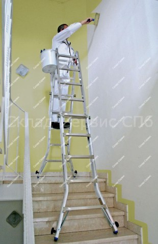 Шарнирная телескопическая лестница KRAUSE с перекладинами и 4 удлинителями боковин